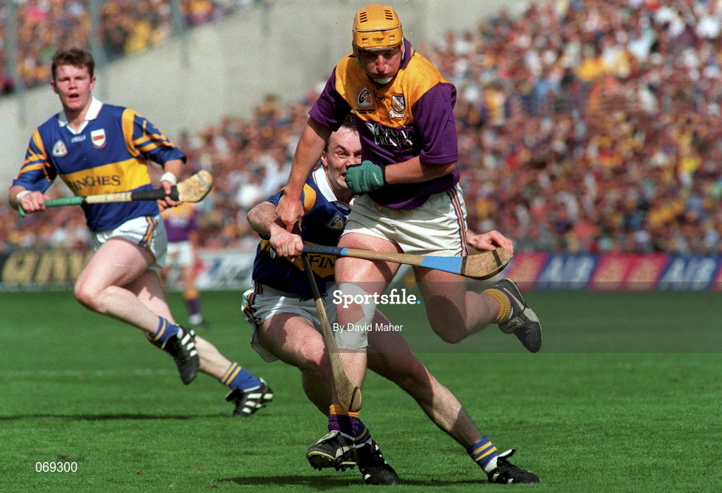 17 August 1997; Garry Laffan of Wexford in action against Michael Ryanduring of Tipperary during the Guinness All-Ireland Senior Hurling Championship Semi-Final match between Tipperary and Wexford at Croke Park in Dublin. Photo by David Maher/Sportsfile
