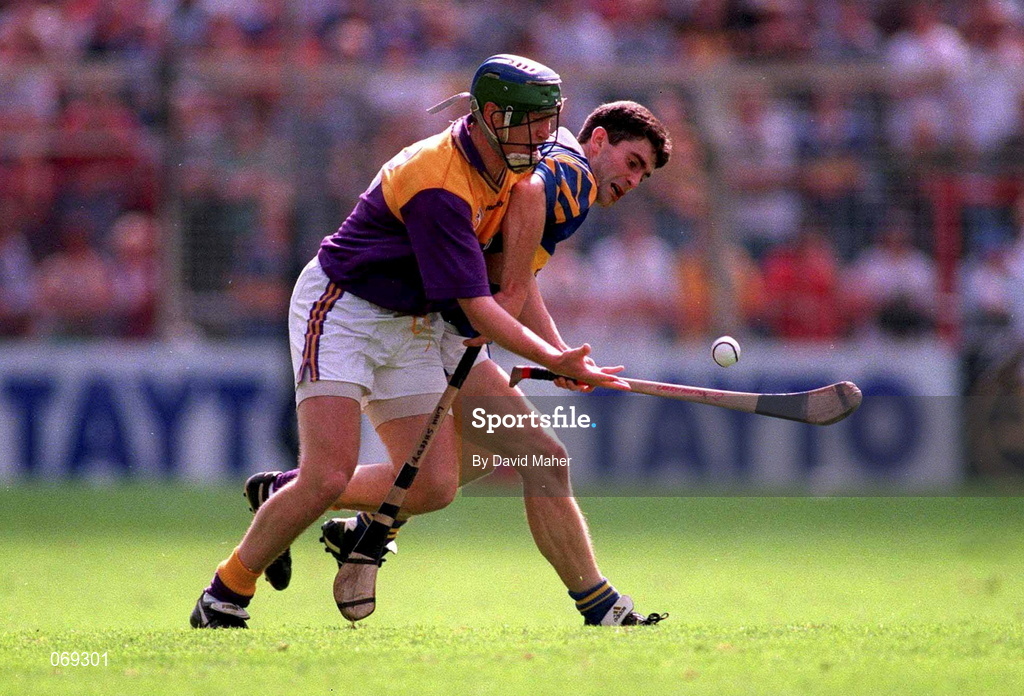 17 August 1997; Larry Murphy of Wexford in action against Liam Sheedy of Tipperary during the Guinness All-Ireland Senior Hurling Championship Semi-Final match between Tipperary and Wexford at Croke Park in Dublin. Photo by David Maher/Sportsfile