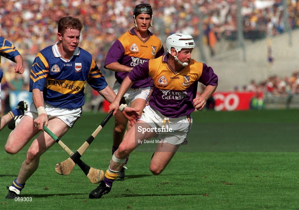 17 August 1997; Tom Dempsey of Wexford in action against Conor Gleeson of Tipperary during the Guinness All-Ireland Senior Hurling Championship Semi-Final match between Tipperary and Wexford at Croke Park in Dublin. Photo by David Maher/Sportsfile
