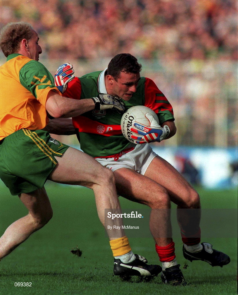 29 September 1996; P.J. Loftus of Mayo in action against Martin O'Connell of Meath during the All-Ireland Senior Football Championship Final Replay match between Meath and Mayo at Croke Park in Dublin. Photo by Ray McManus/Sportsfile