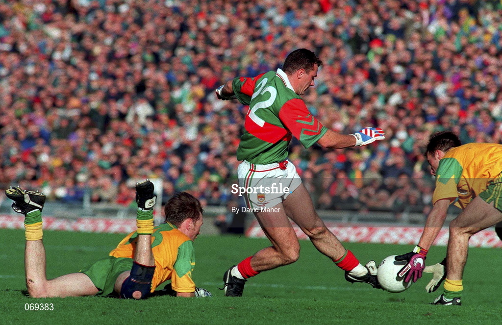 29 September 1996; P.J. Loftus of Mayo in action against Colm Brady, left, and Paddy Reynolds of Meath during the All-Ireland Senior Football Championship Final Replay match between Meath and Mayo at Croke Park in Dublin. Photo by David Maher/Sportsfile