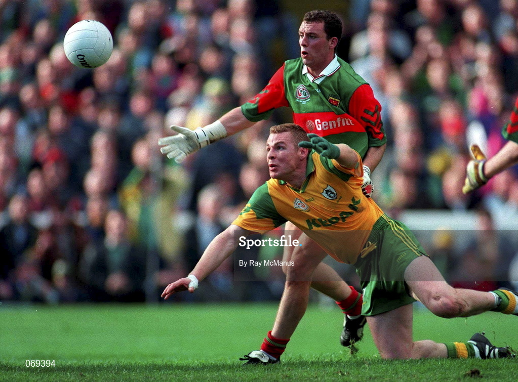 29 September 1996; Tommy Dowd of Meath in action against Kenneth Mortimer of Mayo during the All-Ireland Senior Football Championship Final Replay match between Meath and Mayo at Croke Park in Dublin. Photo by Ray McManus/Sportsfile