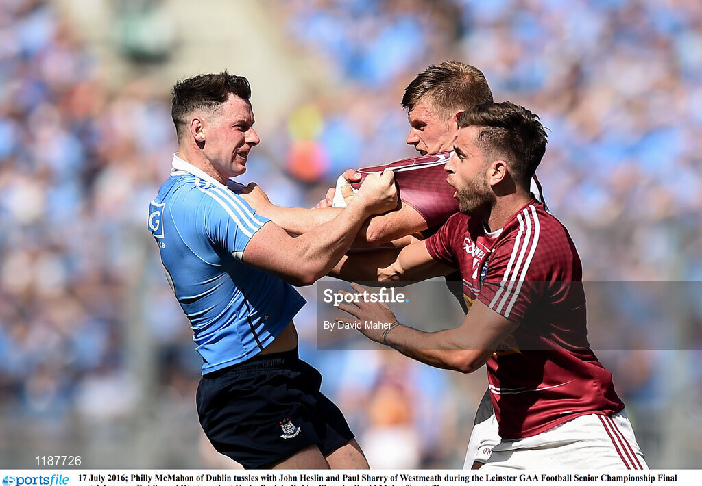 17 July 2016; Philly McMahon of Dublin tussles with John Heslin and Paul Sharry of Westmeath during the Leinster GAA Football Senior Championship Final match between Dublin and Westmeath at Croke Park in Dubin. Photo by David Maher/Sportsfile