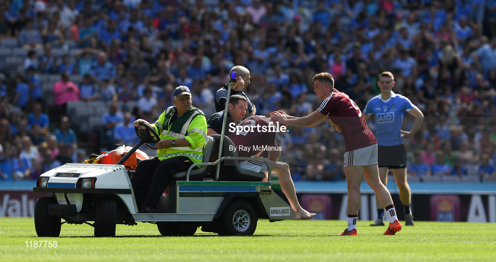 17 July 2016; Ray Connellan is consoled by Ger Egan of Westmeath as he leaves the field injured during the Leinster GAA Football Senior Championship Final match between Dublin and Westmeath at Croke Park in Dubin. Photo by Ray McManus/Sportsfile