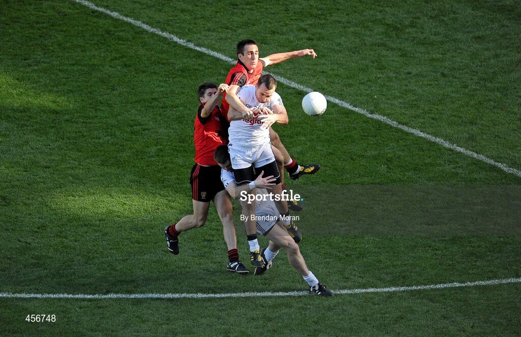 29 August 2010; Robert Kelly, Kildare, beats team-mate Karl Ennis and Down defenders Damien Rafferty, left, and Dan Gordon to the ball during the game. GAA Football All-Ireland Senior Championship Semi-Final, Kildare v Down, Croke Park, Dublin. Picture credit: Brendan Moran / SPORTSFILE