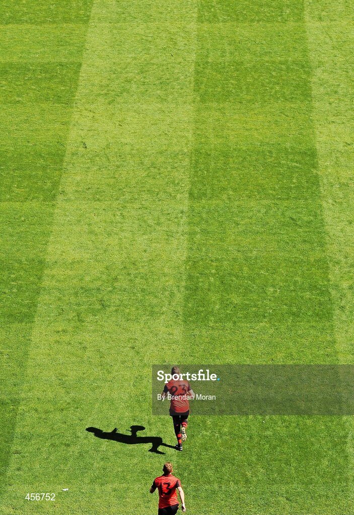 29 August 2010; The Down team are led out by Ambrose Rodgers, 23, and team captain Benny Coulter, 13, before the game. GAA Football All-Ireland Senior Championship Semi-Final, Kildare v Down, Croke Park, Dublin. Picture credit: Brendan Moran / SPORTSFILE