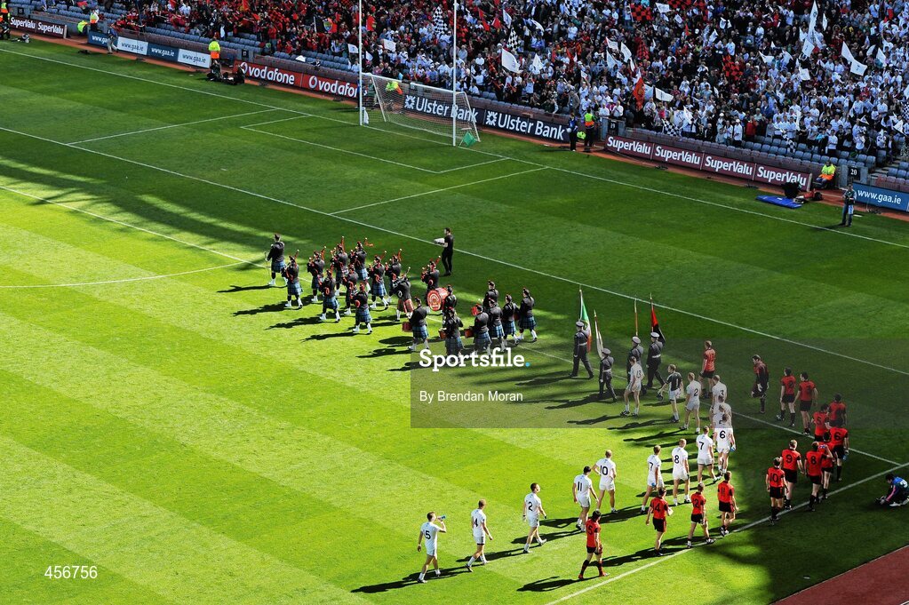 29 August 2010; The Down and Kildare teams walk behind the Dublin Fire Brigade band during the pre-match parade. GAA Football All-Ireland Senior Championship Semi-Final, Kildare v Down, Croke Park, Dublin. Picture credit: Brendan Moran / SPORTSFILE