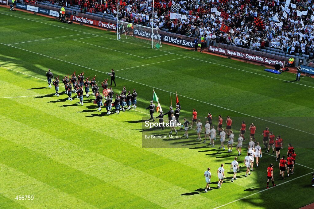 29 August 2010; The Down and Kildare teams walk behind the Dublin Fire Brigade band during the pre-match parade. GAA Football All-Ireland Senior Championship Semi-Final, Kildare v Down, Croke Park, Dublin. Picture credit: Brendan Moran / SPORTSFILE