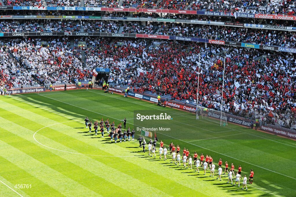 29 August 2010; The Down and Kildare teams walk behind the Dublin Fire Brigade band during the pre-match parade. GAA Football All-Ireland Senior Championship Semi-Final, Kildare v Down, Croke Park, Dublin. Picture credit: Brendan Moran / SPORTSFILE