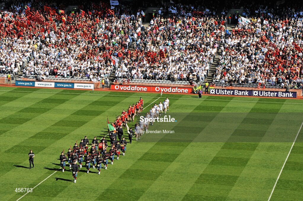 29 August 2010; The Down and Kildare teams walk behind the Dublin Fire Brigade band during the pre-match parade. GAA Football All-Ireland Senior Championship Semi-Final, Kildare v Down, Croke Park, Dublin. Picture credit: Brendan Moran / SPORTSFILE