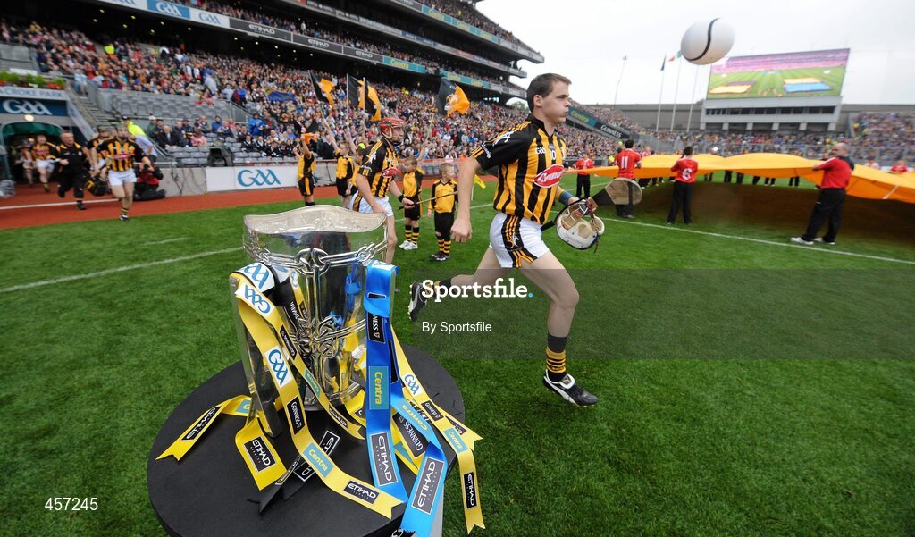 5 September 2010; Kilkenny captain T.J. Reid runs out on to the pitch past the Liam MacCarthy cup. GAA Hurling All-Ireland Senior Championship Final, Kilkenny v Tipperary, Croke Park, Dublin. Photo by Sportsfile