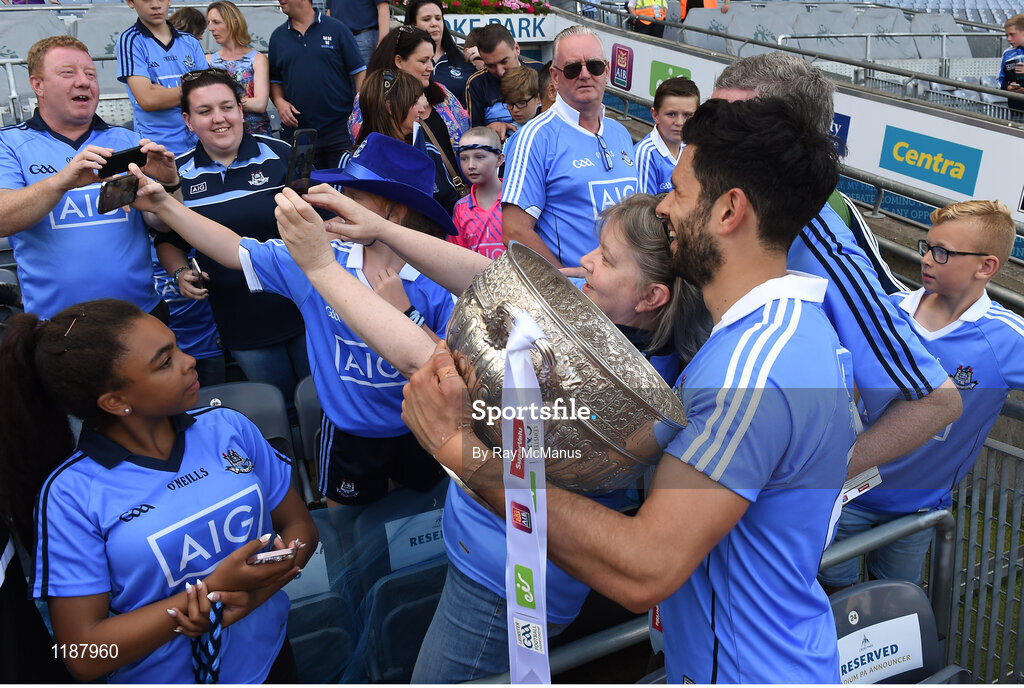17 July 2016; Dublin supporters pose with Cian O'Sullivan and the Delaney Cup after the Leinster GAA Football Senior Championship Final match between Dublin and Westmeath at Croke Park in Dubin. Photo by Ray McManus/Sportsfile