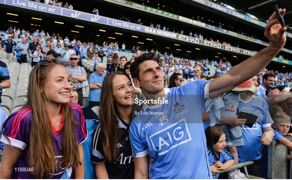 17 July 2016; Dublin's Bernard Brogan takes a 'selfie' for Sarah, left, and Aisling McCann, from Coolneen, Co Clare, but supporting their dad's home county of Dublin, after the Leinster GAA Football Senior Championship Final match between Dublin and Westmeath at Croke Park in Dubin. Photo by Eóin Noonan/Sportsfile