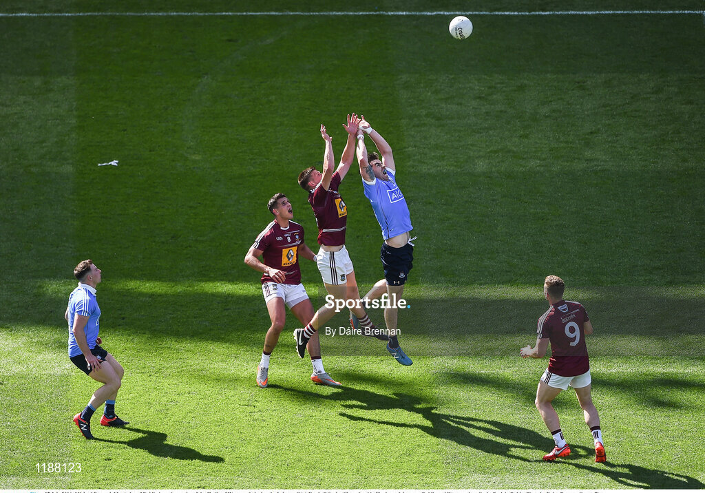 17 July 2016; Michael Darragh MacAuley of Dublin in action against John Heslin of Westmeath during the Leinster GAA Football Senior Championship Final match between Dublin and Westmeath at Croke Park in Dubin. Photo by Daire Brennan/Sportsfile