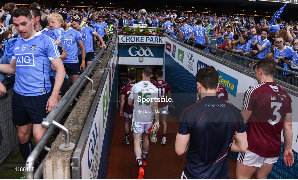 17 July 2016; Members of the Westmeath team leave down the tunnel as Dublin players celebrate  lifting the Delaney Cup afterthe Leinster GAA Football Senior Championship Final match between Dublin and Westmeath at Croke Park in Dubin. Photo by David Maher/Sportsfile