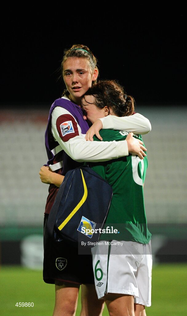 17 September 2010; A dejected Ciara Grant, Republic of Ireland, is comforted by Amanda Budden following their side's defeated to Japan. FIFA U-17 Women’s World Cup Quarter-Final, Republic of Ireland v Japan, Larry Gomes Stadium, Arima, Trinidad, Trinidad & Tobago. Picture credit: Stephen McCarthy / SPORTSFILE