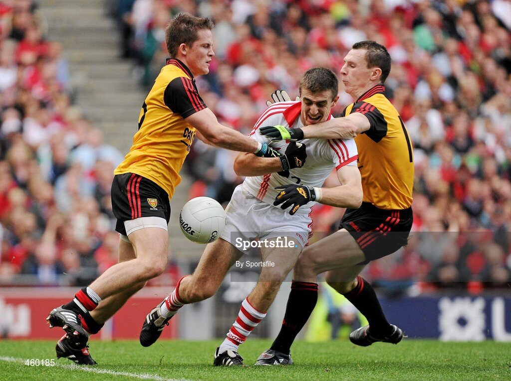 19 September 2010; Ray Carey, Cork, in action against Paul McComiskey, left, and John Clarke, Down. GAA Football All-Ireland Senior Championship Final, Down v Cork, Croke Park, Dublin. Photo by Sportsfile
