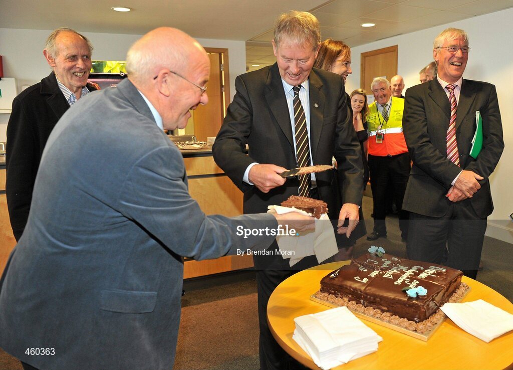 19 September 2010; RTE Gaelic Games Commentator Michéal O Muircheartaigh hands out some cake to mark his retirement, to Seán Bán Breathnach in the press area, watched by journalist Tom O'Riordan and broadcaster Michéal O Sé, before commentating on his last All-Ireland Senior Championship Final after a career lasting 62 years. His first broadcast was the Railway Cup Final on St Patrick's Day 1949. GAA Football All-Ireland Senior Championship Final, Down v Cork, Croke Park, Dublin. Picture credit: Brendan Moran / SPORTSFILE