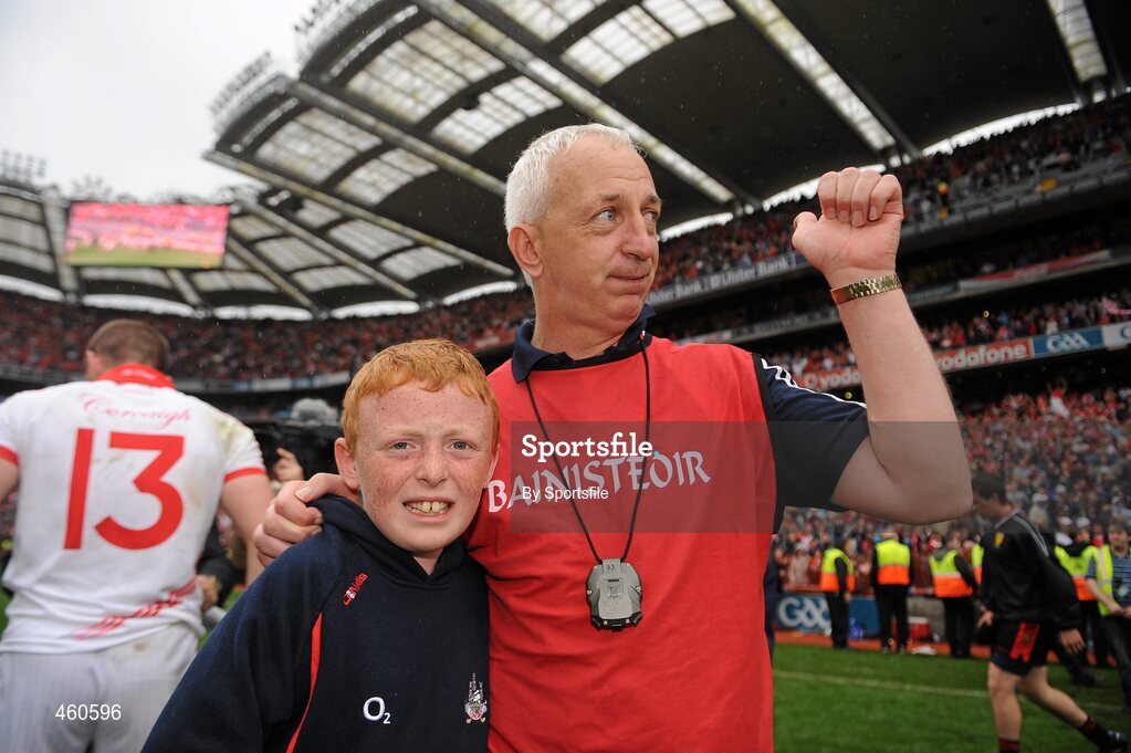 19 September 2010; Cork manager Conor Counihan celebrates with his son Oisin, aged 9, after the game. GAA Football All-Ireland Senior Championship Final, Down v Cork, Croke Park, Dublin. Photo by Sportsfile