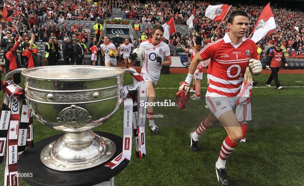 19 September 2010; Aidan Walsh and Alan Quirke, right, Cork, run out on to the pitch past the Sam Maguire cup. GAA Football All-Ireland Senior Championship Final, Down v Cork, Croke Park, Dublin. Photo by Sportsfile