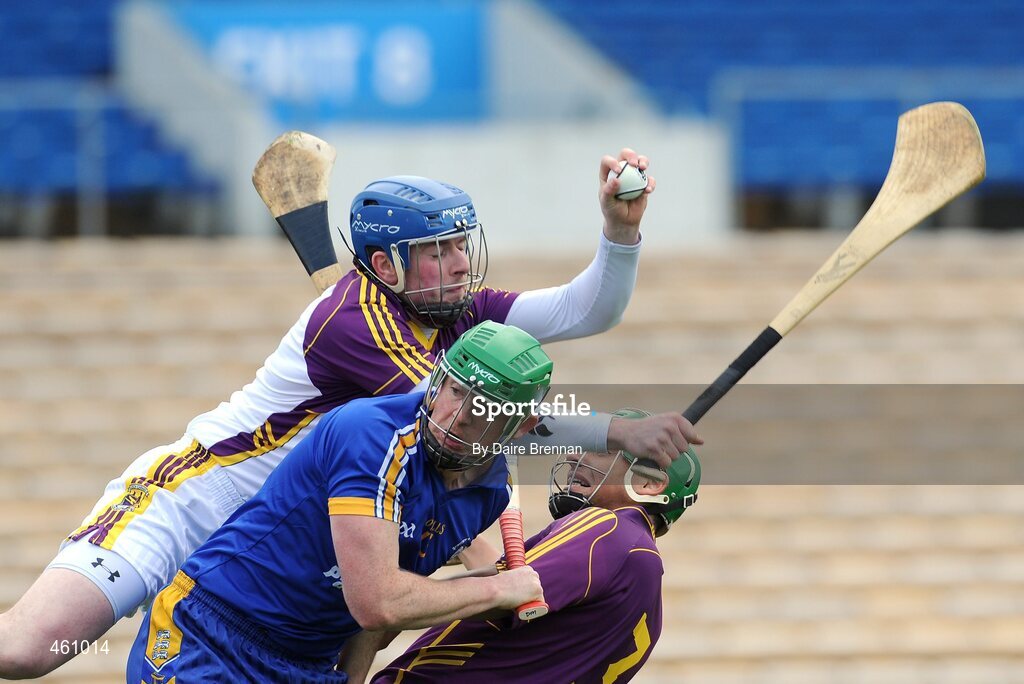 2 May 2010; Wexford goalkeeper Noel Carton collects the ball ahead of team-mate Keith Rossiter and Diarmuid McMahon, Clare. Allianz GAA Hurling National League Division 2 Final, Clare v Wexford, Semple Stadium, Thurles, Co Tipperary. Picture credit: Daire Brennan / SPORTSFILE
