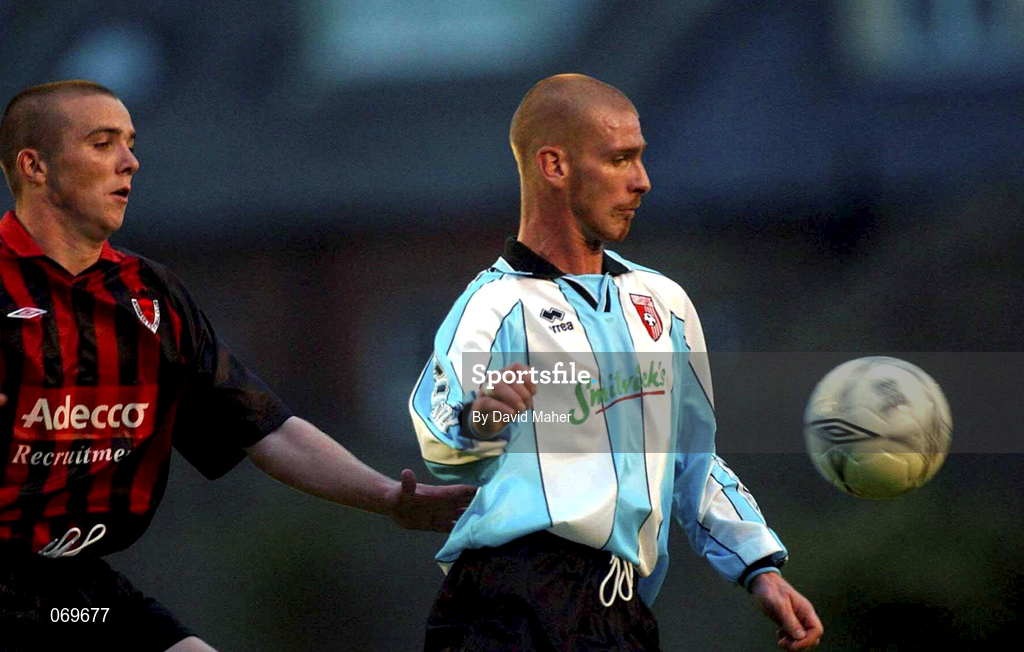 10 August 2001; Jamie Hughes of Derry City in action against Brian Shelley of Bohemians during the eircom League Premier Division match between Bohemians and Derry City at Dalymount Park in Dublin. Photo by David Maher/Sportsfile