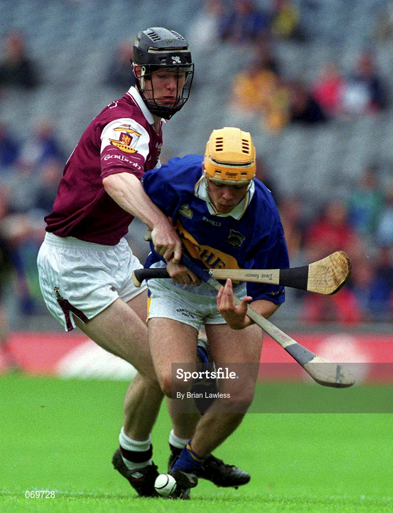 12 August 2001; David Morrissey of Tipperary in action against Tony Óg Regan of Galway during the All-Ireland Minor Hurling Championship Semi-Final match between Galway and Tipperary at Croke Park in Dublin. Photo by Brian Lawless/Sportsfile