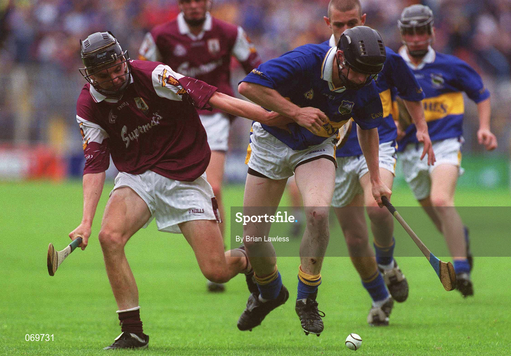 12 August 2001; Shane Sweeney of Tipperary in action against Johnnie Maher of Galway during the All-Ireland Minor Hurling Championship Semi-Final match between Galway and Tipperary at Croke Park in Dublin. Photo by Brian Lawless/Sportsfile