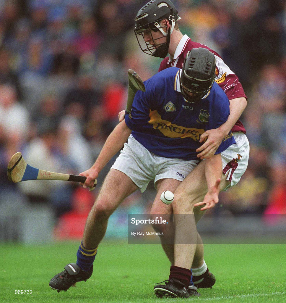 12 August 2001; Francis Devanney of Tipperary in action against Tony Óg Regan of Galway during the All-Ireland Minor Hurling Championship Semi-Final match between Galway and Tipperary at Croke Park in Dublin. Photo by Ray McManus/Sportsfile