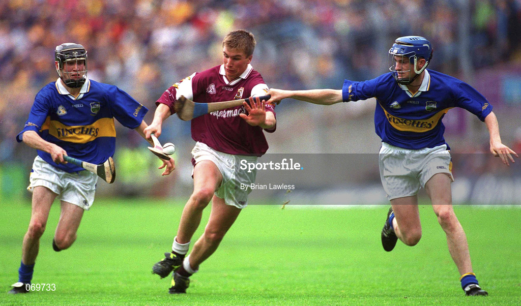 12 August 2001; Kevin Hayes of Galway in action against Pat Buckley, right, and Dara Walton of Tipperary during the All-Ireland Minor Hurling Championship Semi-Final match between Galway and Tipperary at Croke Park in Dublin. Photo by Brian Lawless/Sportsfile