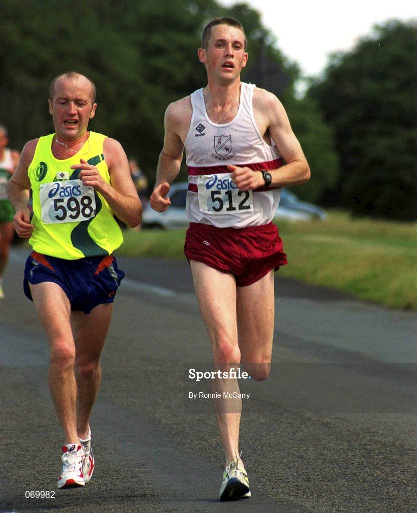 11 August 2001; Colin Dalton, 512, of Civil Service AC, on his way to winning Frank Duffy 10 mile road race, ahead of eventual second place finisher Alan Merriman of Liffey Valley AC during the Frank Duffy 10 Mile Road Race in Dublin. Photo by Ronnie McGarry/Sportsfile