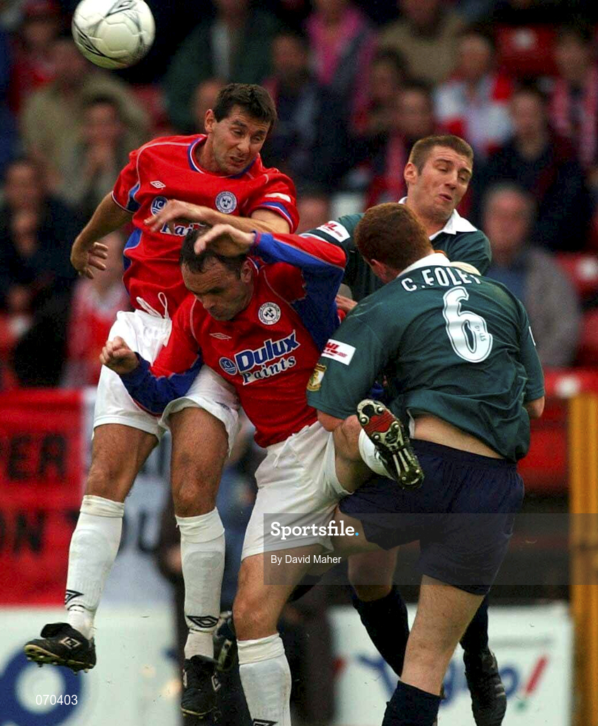 17 August 2001; Brian Byrne and Garry Haylock of Shelbourne in action against Colm Foley, 6, and Trevor Croly of St Patrick's Athletic during the eircom League Premier Division match between Shelbourne and St Patrick's Athletic at Tolka Park in Dublin. Photo by David Maher/Sportsfile
