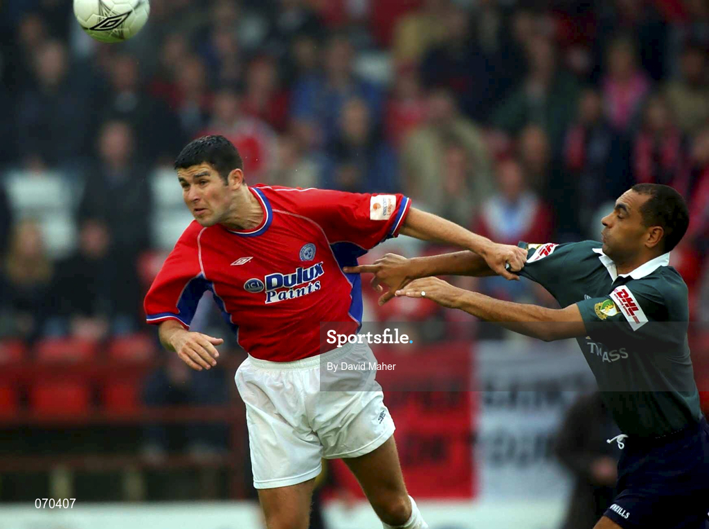 17 August 2001; Davy Byrne of Shelbourne in action against Paul Osam of St Patrick's Athletic during the eircom League Premier Division match between Shelbourne and St Patrick's Athletic at Tolka Park in Dublin. Photo by David Maher/Sportsfile