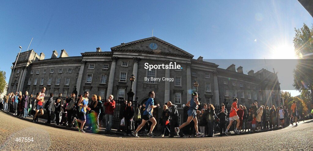 25 October 2010; Competitors pass Trinity College on their way to the finish of the Lifestyle Sports - adidas Dublin Marathon 2010. Picture credit: Barry Cregg / SPORTSFILE