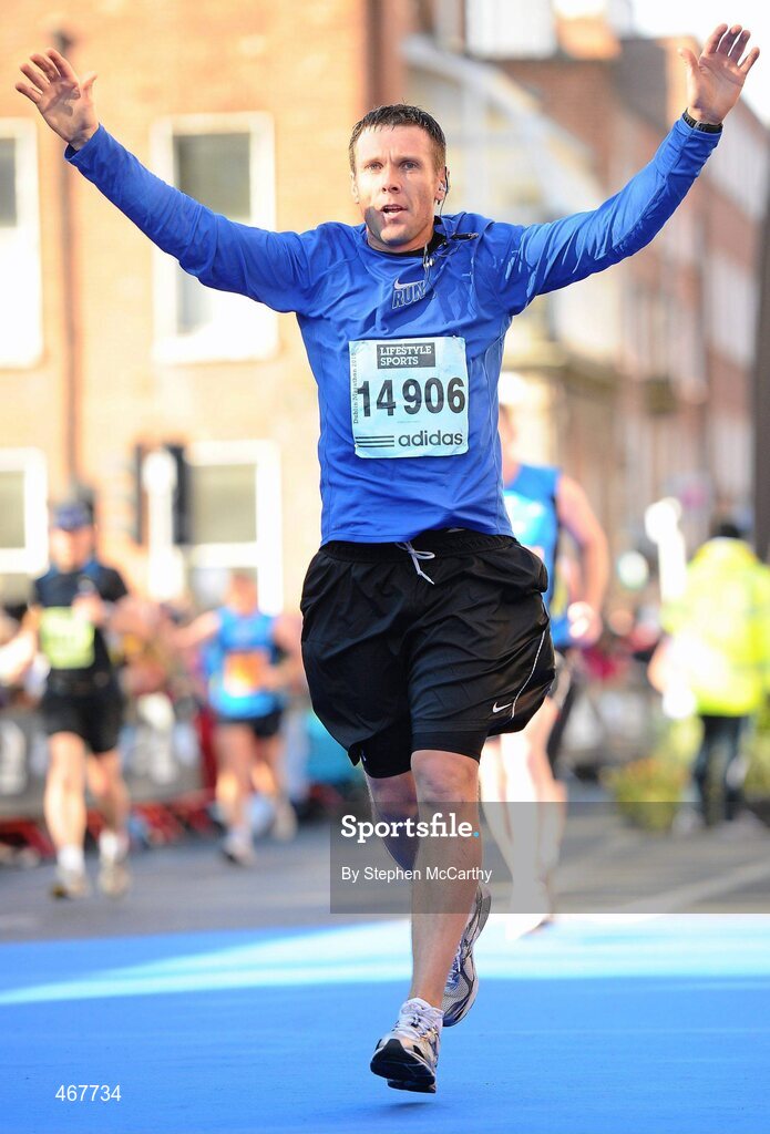 25 October 2010; Gary Hancox, from Clondalkin, Dublin, on the approach to the finish during the Lifestyle Sports - adidas Dublin Marathon 2010. Dublin. Picture credit: Stephen McCarthy / SPORTSFILE