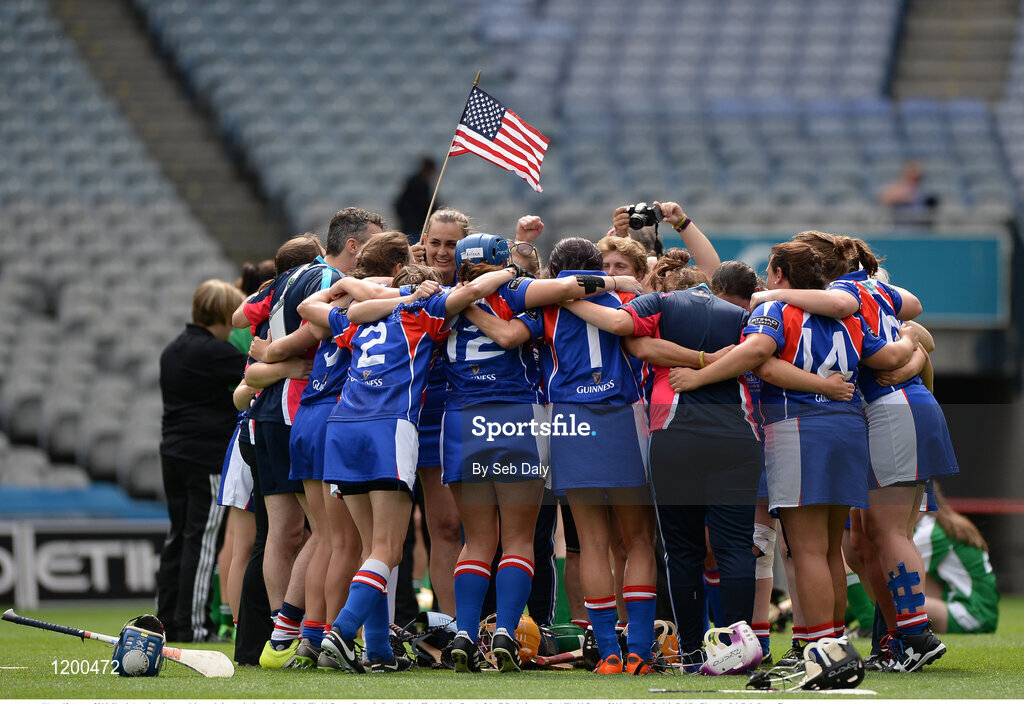 12 August 2016; North America players celebrate their team's victory in the GAA World Games Camogie Cup (Native) Final during Day 4 of the Etihad Airways GAA World Games 2016 at Croke Park in Dublin. Photo by Seb Daly/Sportsfile