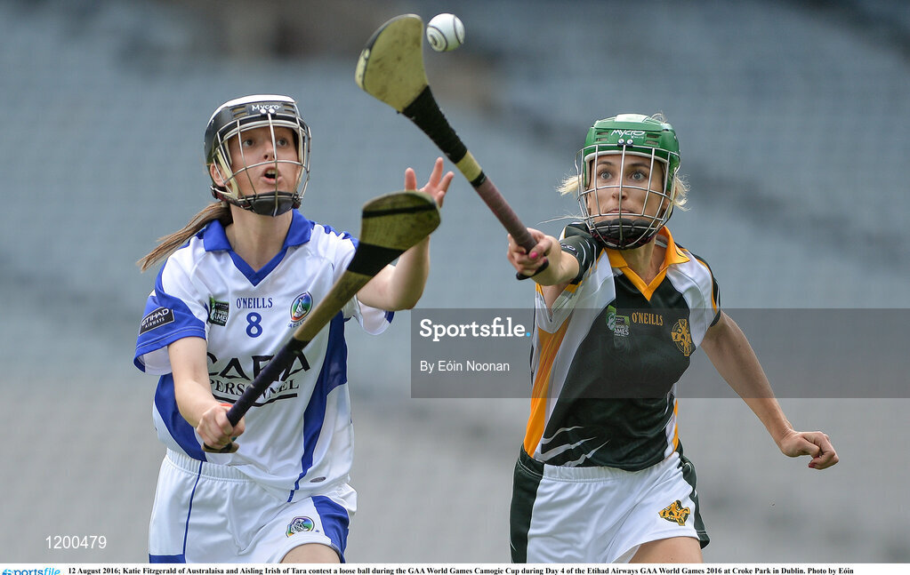 12 August 2016; Katie Fitzgerald of Australaisa and Aisling Irish of Tara contest a loose ball during the GAA World Games Camogie Cup during Day 4 of the Etihad Airways GAA World Games 2016 at Croke Park in Dublin. Photo by Eóin Noonan/Sportsfile