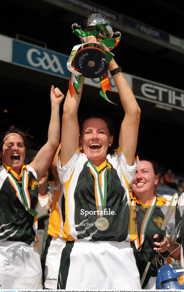 12 August 2016; Captain of Australia Kiera Kinahan Murphy lifts the trophy following her side's victory in the GAA World Games Camogie Cup Final during Day 4 of the Etihad Airways GAA World Games 2016 at Croke Park in Dublin. Photo by Seb Daly/Sportsfile