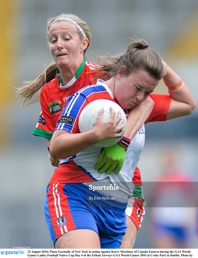 12 August 2016; Fiona Gormally of New York in action against Kerry Mortimer of Canada Eastern during the GAA World Games Ladies Football Native Cup Day 4 of the Etihad Airways GAA World Games 2016 at Croke Park in Dublin. Photo by Eóin Noonan/Sportsfile