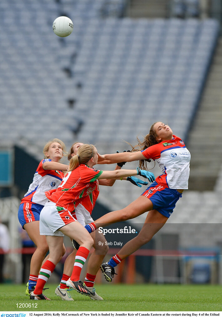12 August 2016; Kelly McCormack of New York is fouled by Jennifer Keir of Canada Eastern at the restart during Day 4 of the Etihad Airways GAA World Games 2016 at Croke Park in Dublin. Photo by Seb Daly/Sportsfile