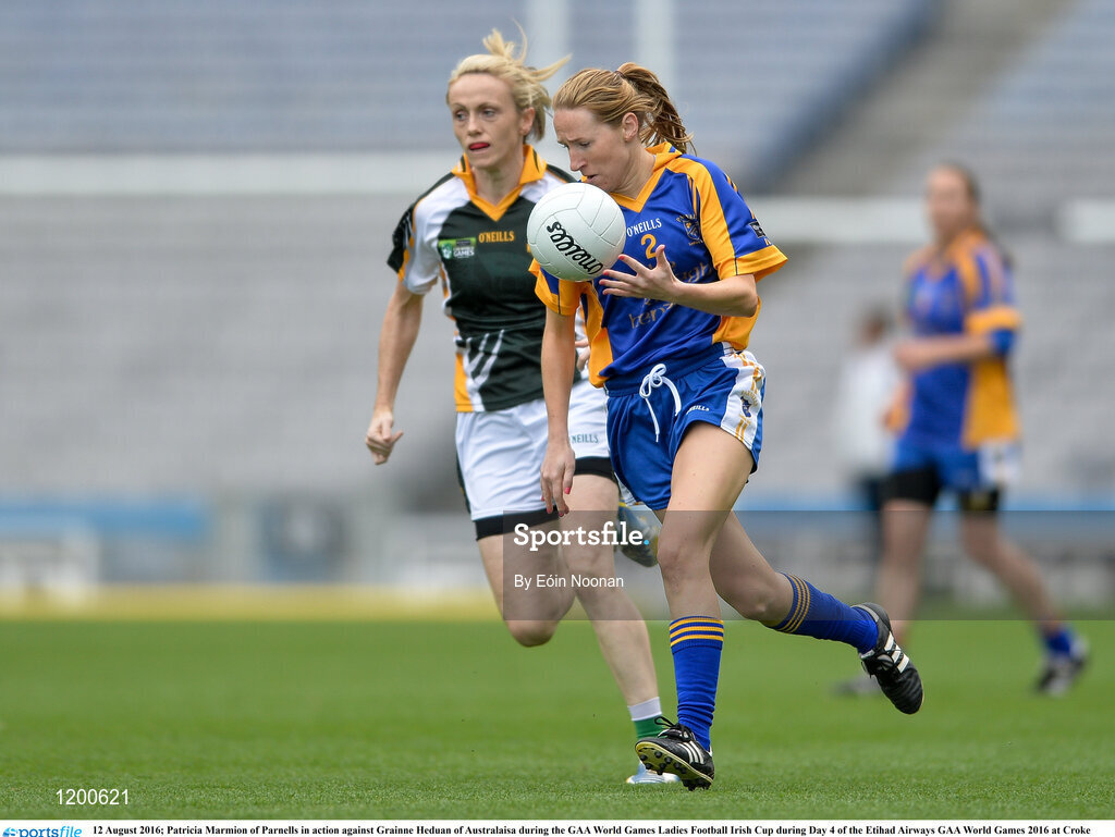 12 August 2016; Patricia Marmion of Parnells in action against Grainne Heduan of Australaisa during the GAA World Games Ladies Football Irish Cup during Day 4 of the Etihad Airways GAA World Games 2016 at Croke Park in Dublin. Photo by Eóin Noonan/Sportsfile