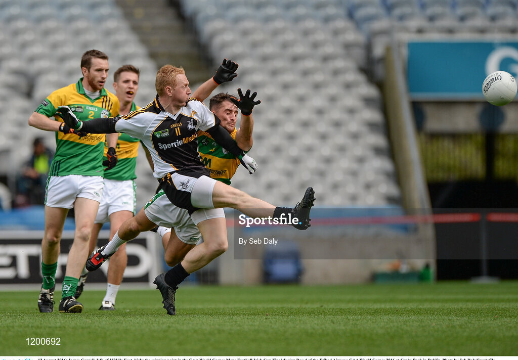 12 August 2016; James Carroll, left, of Middle East, kicks the winning point in the GAA World Games Mens Football Irish Cup Final during Day 4 of the Etihad Airways GAA World Games 2016 at Croke Park in Dublin. Photo by Seb Daly/Sportsfile