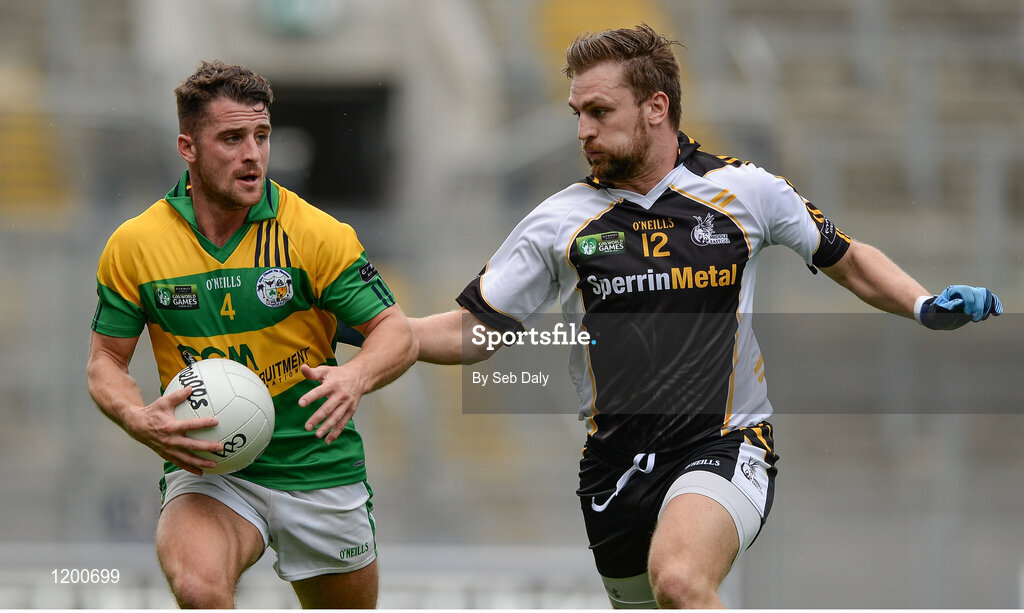 12 August 2016; Joe O'Heaghra, left, of Abu Dhabi Na Fianna in action against Kevin Mossey of Middles East during Day 4 of the Etihad Airways GAA World Games 2016 at Croke Park in Dublin. Photo by Seb Daly/Sportsfile