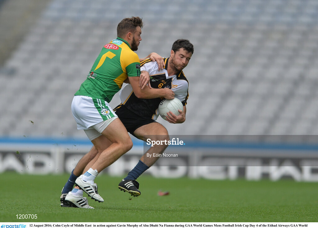 12 August 2016; Colm Coyle of Middle East  in action against Gavin Murphy of Abu Dhabi Na Fianna during GAA World Games Mens Football Irish Cup Day 4 of the Etihad Airways GAA World Games 2016 at Croke Park in Dublin. Photo by Eóin Noonan/Sportsfile