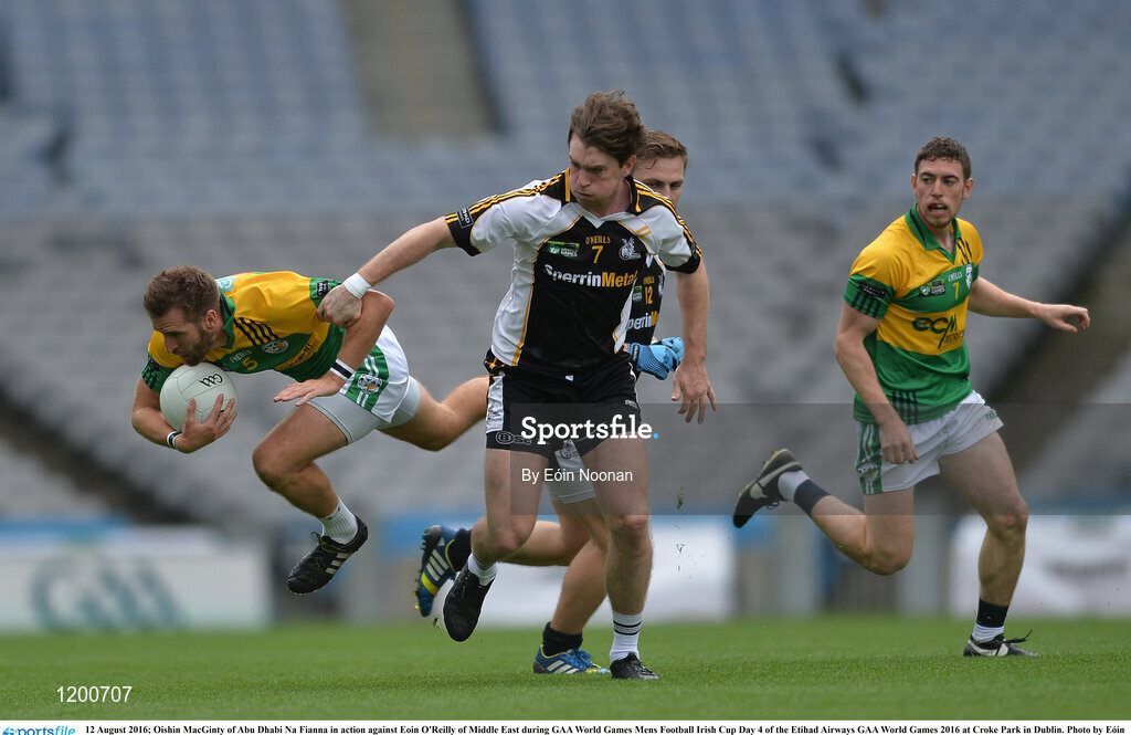 12 August 2016; Oishin MacGinty of Abu Dhabi Na Fianna in action against Eóin O'Reilly of Middle East during GAA World Games Mens Football Irish Cup Day 4 of the Etihad Airways GAA World Games 2016 at Croke Park in Dublin. Photo by Eóin Noonan/Sportsfile
