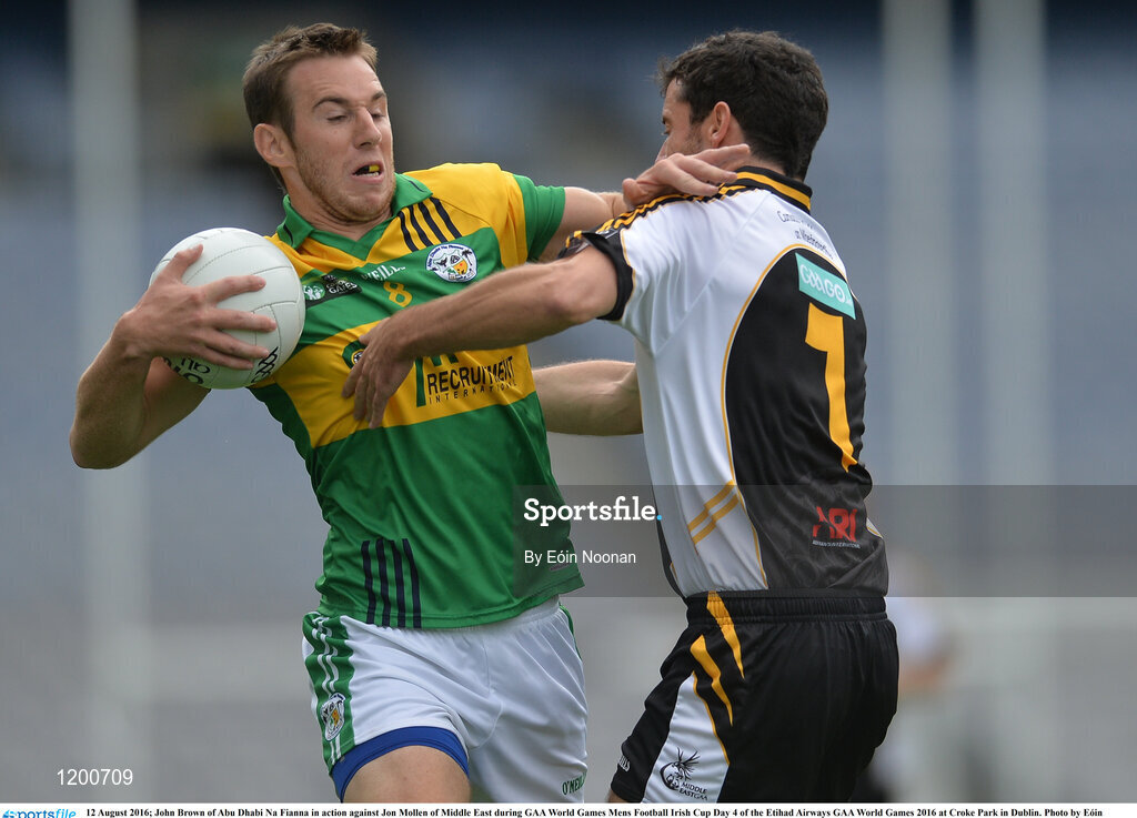12 August 2016; John Brown of Abu Dhabi Na Fianna in action against Jon Mollen of Middle East during GAA World Games Mens Football Irish Cup Day 4 of the Etihad Airways GAA World Games 2016 at Croke Park in Dublin. Photo by Eóin Noonan/Sportsfile
