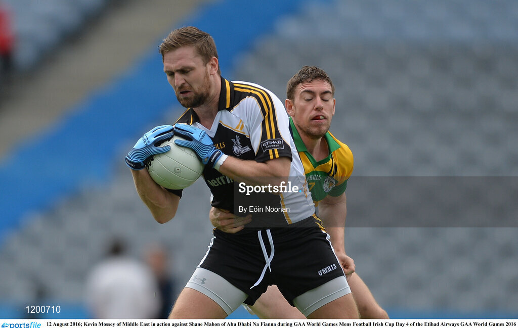 12 August 2016; Kevin Mossey of Middle East in action against Shane Mahon of Abu Dhabi Na Fianna during GAA World Games Mens Football Irish Cup Day 4 of the Etihad Airways GAA World Games 2016 at Croke Park in Dublin. Photo by Eóin Noonan/Sportsfile