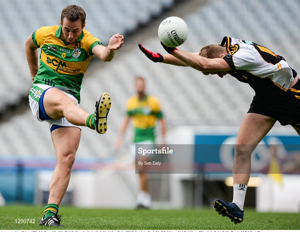 12 August 2016; John Brown, left, of Abu Dhabi Na Fianna has his shot blocked by Aindreas Doyle of Middle East during Day 4 of the Etihad Airways GAA World Games 2016 at Croke Park in Dublin. Photo by Seb Daly/Sportsfile