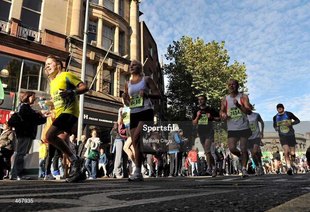 25 October 2010; Competitors make their way from Trinity College towards the finish during the Lifestyle Sports - adidas Dublin Marathon 2010, Merrion Square, Dublin. Picture credit: Barry Cregg / SPORTSFILE