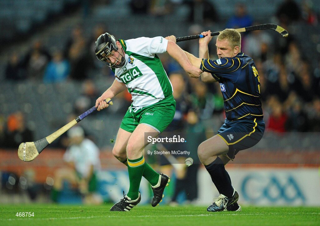 30 October 2010; Andy O'Brien, Ireland, in action against Scott Campbell, Scotland. Senior Hurling / Shinty International 1st Test, Ireland v Scotland, Croke Park, Dublin. Picture credit:  Stephen McCarthy / SPORTSFILE